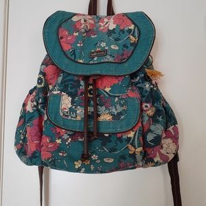 Sakroots backpack with makeup bag.